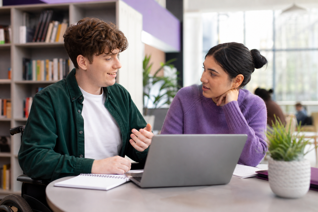 Young adult and mentor planning employment or study goals